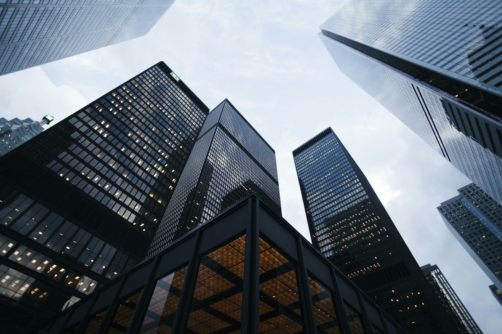 Modern glass building facade viewed from street level